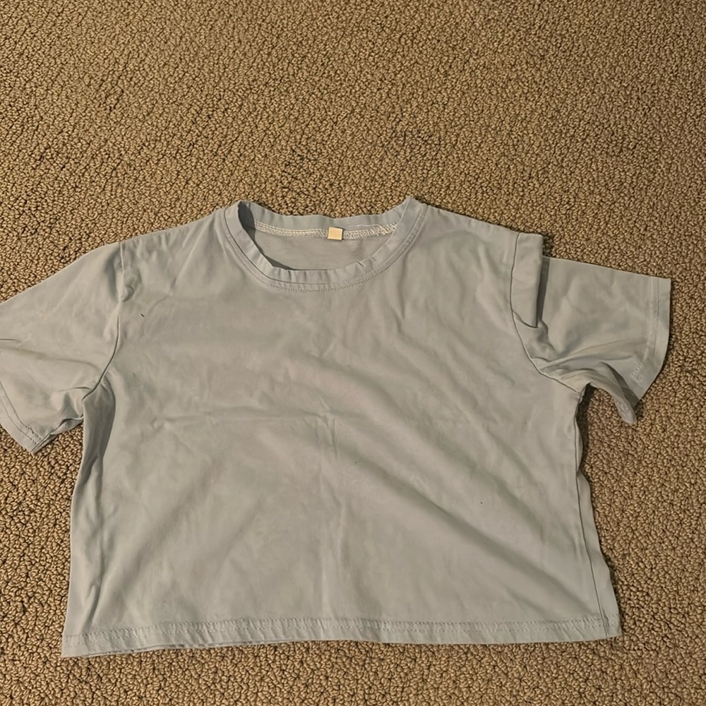 light blue cropped tee, barley worn